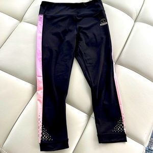 Mid-shin length Just Cleave black leggings. Size 4.